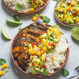 Jerk Chicken Thighs with Paprika Rice & Mango Salsa